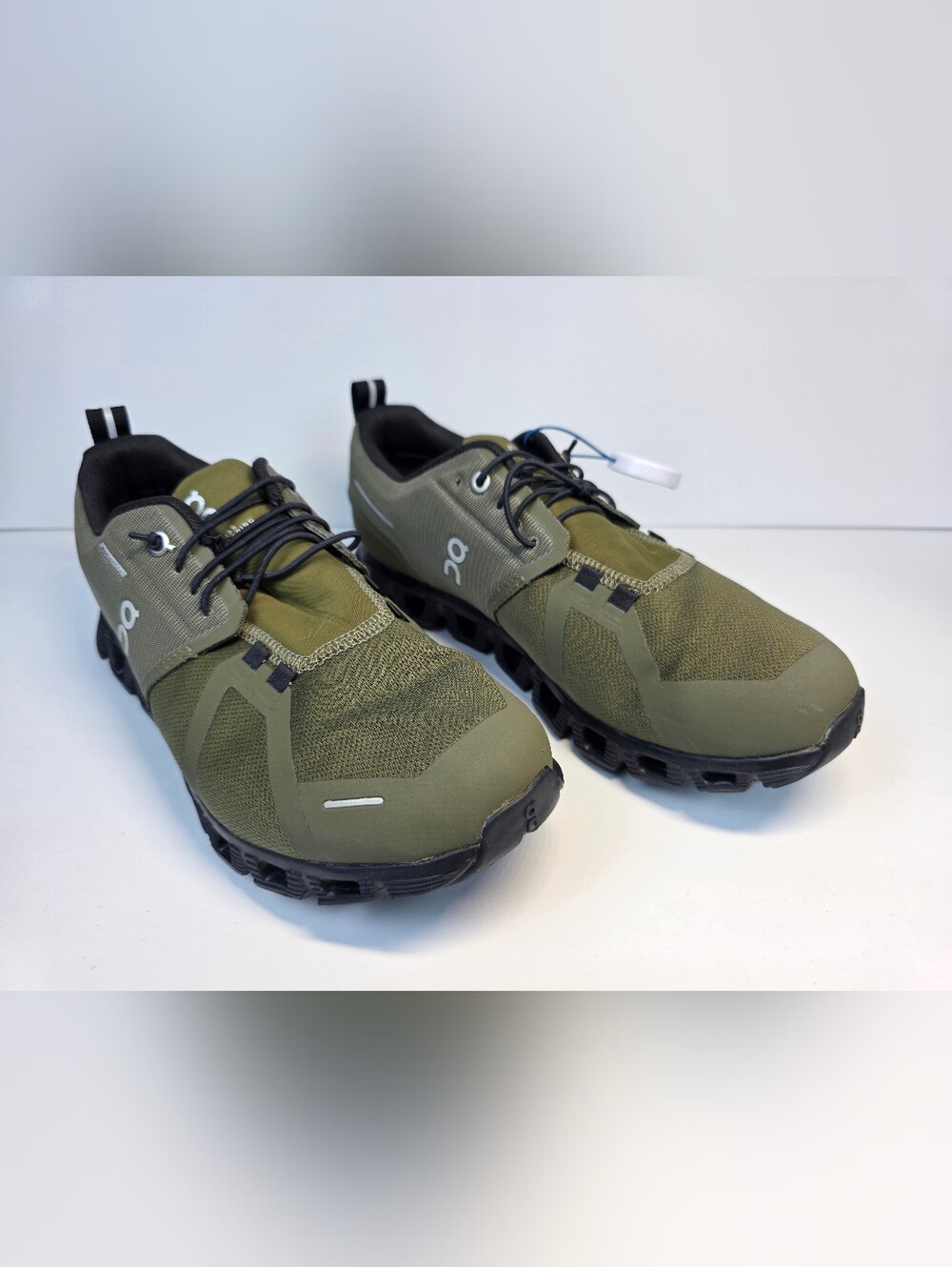 On Running Olive Green and Black Cloudventure Trail Sneakers